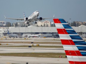 American Airlines flight 718, the first U.S. Boeing 737 MAX commercial flight since regulators lifted a 20-month grounding in November, takes off from Miami, Fla., Dec. 29, 2020.