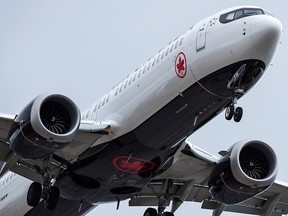 An Air Canada Boeing 737 Max 8 aircraft arriving from Toronto prepares to land at Vancouver International Airport, in Richmond, B.C., Tuesday, March 12, 2019.