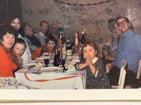 A young (and still sober) Beezer enjoys Christmas dinner with his crazed clan, including his mom Verna (left) and older brother Mike (right). His grandpa is in the back.