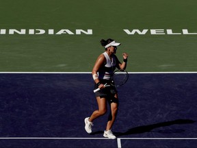 Bianca Andreescu celebrates a point against Angelique Kerber during the women's final of the BNP Paribas Open at the Indian Wells Tennis Garden in Indian Wells, Calif., March 17, 2019.