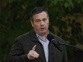 Alberta Premier Jason Kenney answers questions at a news conference in Calgary, Alta., Sept. 15, 2020.