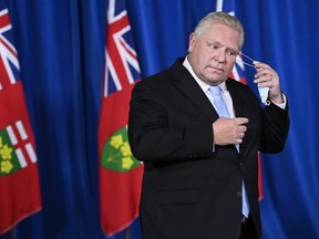 Ontario Premier Doug Ford holds a press conference at Queen's Park during the COVID-19 pandemic in Toronto on Monday, December 21, 2020.