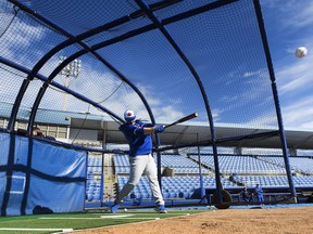 Blue Jays catcher Danny Jansen takes part in batting practice during spring training in Dunedin, Fla. The Vancouver Canadians will be moving to the high-A level, replacing the Dunedin Blue Jays as part of an overhaul of the minor-league system.