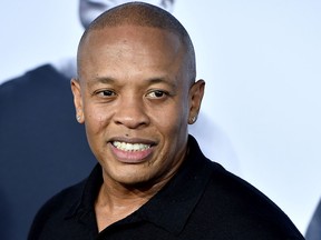 Rapper Dr. Dre arrives at the premiere of "Straight Outta Compton" at the Microsoft Theatre on August 10, 2015 in Los Angeles.