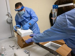 The first shipment of the Pfizer COVID-19 vaccine arrives at an Edmonton vaccination site on Tuesday, December 15, 2020.