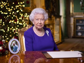 In this pool image released on December 25th, Queen Elizabeth II records her annual Christmas broadcast in Windsor Castle, Windsor, England.