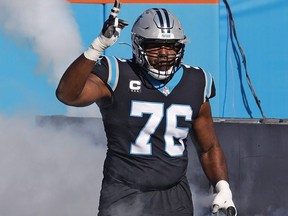 Russell Okung of the Carolina Panthers takes the field prior to the game against the Denver Broncos at Bank of America Stadium on Dec. 13, 2020 in Charlotte, N.C.