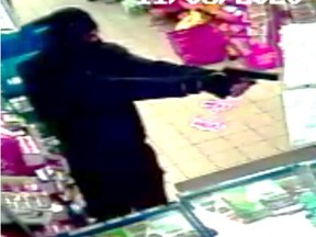 An image released by York Regional Police of a man wielding a gun during a Nov. 3 robbery in Richmond Hill.