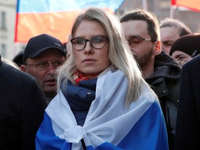 Russian opposition figure Lyubov Sobol takes part in a rally to mark the 5th anniversary of opposition politician Boris Nemtsov's murder and to protest against proposed amendments to the country's constitution, in Moscow, February 29, 2020.