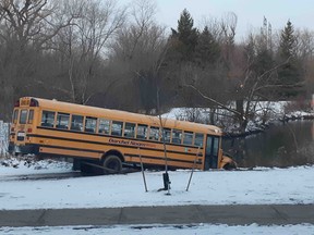 A stolen school bus is seen in a pond at Marita Payne Park in Vaughan on Dec. 3, 2020.