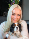 Lindsey Vonn enjoying some downtime with her dog Lucy.