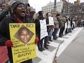This Nov. 25, 2014, file photo shows demonstrators blocking Public Square in Cleveland, during a protest over the police shooting of 12-year-old Tamir Rice.