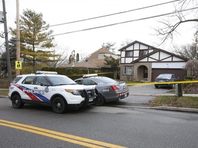 Toronto Police at the scene on Nymark Ave., northwest of Don Mills Rd and Sheppard Ave. E., on December 22, 2020., the day after a fatal stabbing.