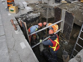Watermain repair is done on Parliament St. just north of King St. in Toronto.