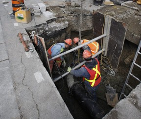 Watermain repair is done on Parliament St. just north of King St. in Toronto.