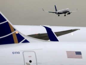 A United Airlines passenger jet lands at Newark Liberty International Airport, New Jersey, U.S. December 6, 2019.