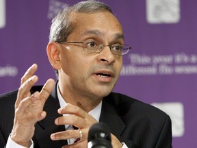 In this file photo taken on Oct. 30, 2009, Dr. Vivek Goel speaks at an H1N1 flu press conference in Toronto.