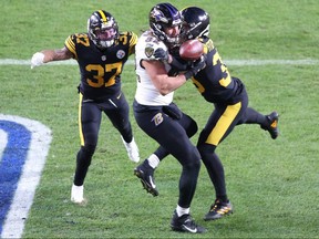 Pittsburgh Steelers free safety Minkah Fitzpatrick (39) breaks up a pass in the end-zone intended for Baltimore Ravens tight end Luke Willson (82) to end the first half at Heinz Field on Dec. 2, 2020.