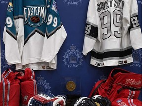Brantford police said Tuesday they have laid charges after the theft of Wayne Gretzky sports memorabilia from the home of Walter Gretzky.