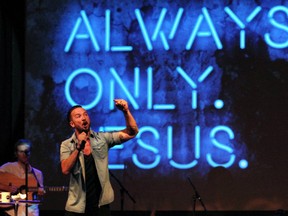 Carl Lentz, a former pastor at Hillsong NYC Church, leads a service at Irving Plaza in New York on July 14, 2013.