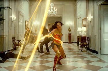 Gal Gadot swinging the Lasso of Truth in a scene from Wonder Woman 1984.