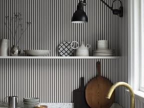 Narrow striped Sandberg wallpaper sets a gentle mood in this unfussy kitchen. SUPPLIED