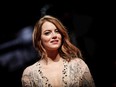 Emma Stone walks the red carpet ahead of the 'The Favourite' screening during the 75th Venice Film Festival at Sala Grande on August 30, 2018 in Venice, Italy.