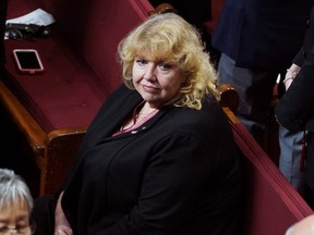 Sen. Lynn Beyak waits for the thronespeech in the Senate chamber in Ottawa, Dec. 5, 2019.