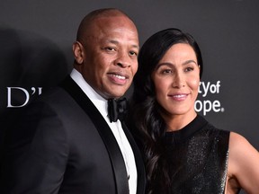 Dr. Dre and Nicole Young attend the City of Hope Spirit of Life Gala 2018 at Barker Hangar on October 11, 2018 in Santa Monica, California.