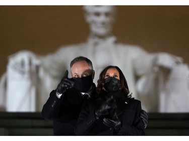 U.S. Vice-President Kamala Harris and her husband Doug Emhoff attend a televised ceremony at the Lincoln Memorial on Jan. 20, 2021 in Washington, D.C.