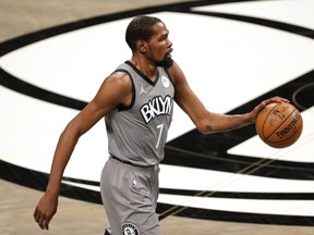 Kevin Durant of the Brooklyn Nets dribbles during the second half against the Washington Wizards at Barclays Center on January 03, 2021 in the Brooklyn borough of New York City.