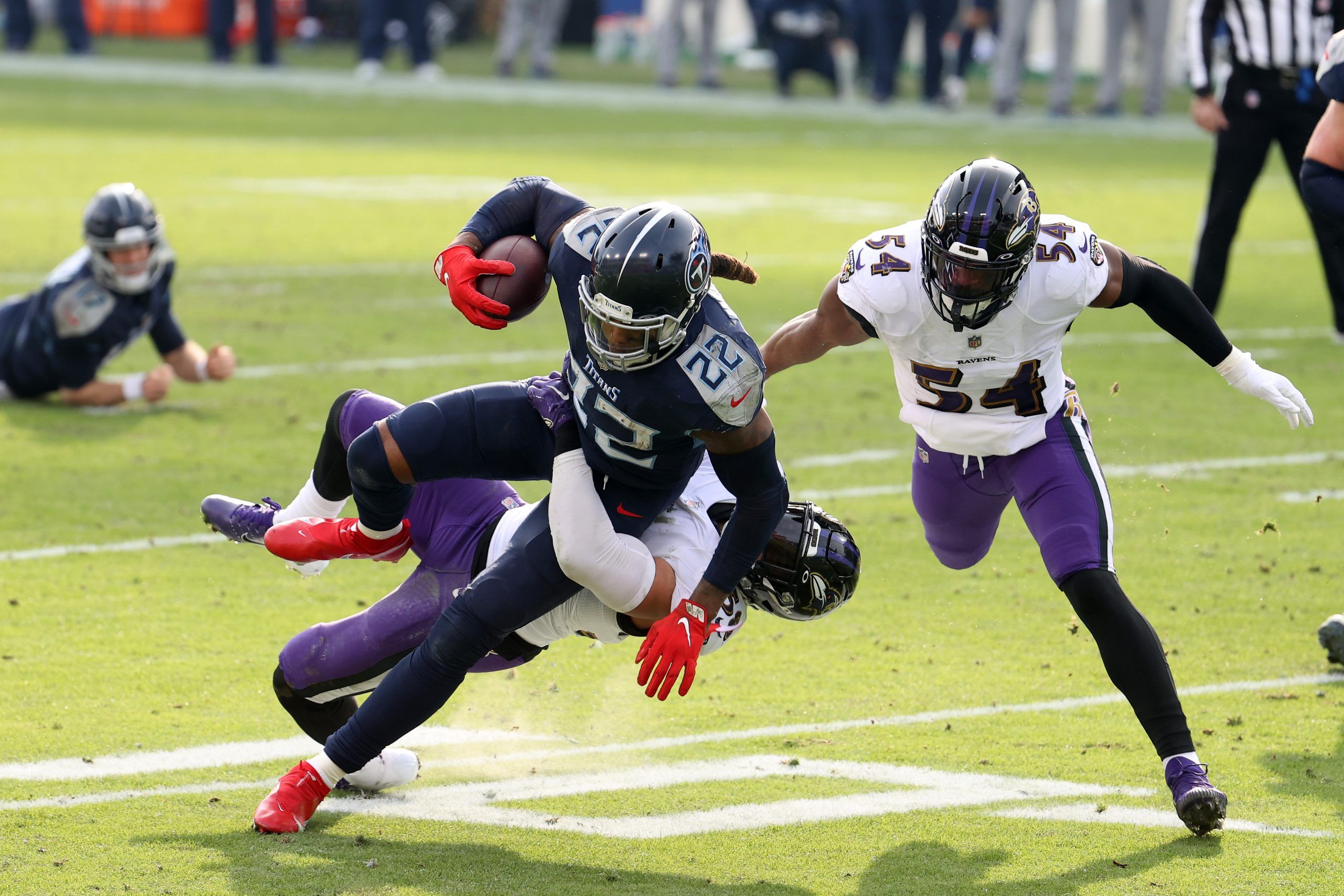 Ravens defeat Titans 20-13 as Lamar Jackson gets first playoff win