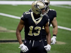 Michael Thomas of the New Orleans Saints reacts following his 11-yard touchdown during the first quarter against the Chicago Bears in the NFC Wild Card Playoff game at Mercedes Benz Superdome on January 10, 2021 in New Orleans, Louisiana.