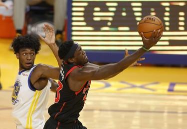 SAN FRANCISCO, CALIFORNIA - JANUARY 10:  Pascal Siakam #43 of the Toronto Raptors goes up for a shot on James Wiseman #33 of the Golden State Warriors at Chase Center on January 10, 2021 in San Francisco, California. NOTE TO USER: User expressly acknowledges and agrees that, by downloading and or using this photograph, User is consenting to the terms and conditions of the Getty Images License Agreement.  (Photo by Ezra Shaw/Getty Images)