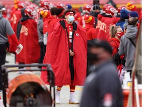 Quarterback Patrick Mahomes #15 of the Kansas City Chiefs looks on from the sidelines during the second quarter of the AFC Divisional Playoff game against the Cleveland Browns at Arrowhead Stadium on January 17, 2021 in Kansas City, Missouri.