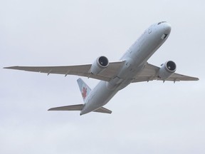 An Air Canada 787 passenger plane takes off at Pearson International Airport on Jan. 24, 2021.