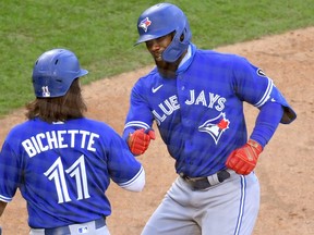 Toronto Blue Jays left fielder Teoscar Hernandez (37) celebrates his two-run home run with shortstop Bo Bichette (11) during the seventh inning against the Philadelphia Phillies at Citizens Bank Park Sept 20, 2020.