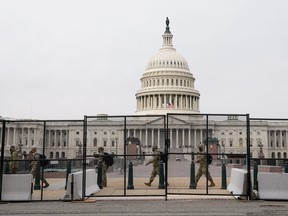 Security fencing surrounds the U.S. Capitol days after supporters of U.S. President Donald Trump stormed the Capitol in Washington, U.S. January 11, 2021.
