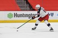 Columbus Blue Jackets center Pierre-Luc Dubois (18) brings the puck up ice to score a goal against the Detroit Red Wings during the third period at Little Caesars Arena in Detroit on Jan. 18, 2021.