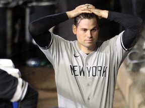 Adam Ottavino of the New York Yankees reacts after giving up six runs, including a grand slam to Danny Jansen of the Toronto Blue Jays, during the sixth inning at Sahlen Field on Sept. 7, 2020 in Buffalo, N.Y.
