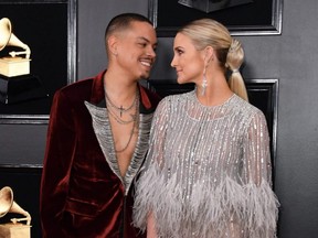 Singer Ashlee Simpson and husband Evan Ross arrive for the 61st Annual Grammy Awards in Los Angeles, Feb. 10, 2019.