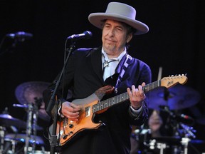 This file photo taken July 22, 2012 shows Bob Dylan performing on stage during the 21st edition of the Vieilles Charrues music festival in Carhaix-Plouguer, France.