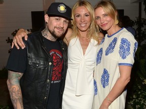 Left to right: Musician Benji Madden, author Vicky Vlachonis, and actress Cameron Diaz celebrate the launch of The Body Doesn't Lie by Vicky Vlachonis on May 15, 2014 in Los Angeles, Calif.