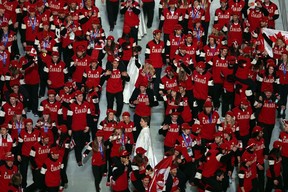 The Sochi Winter Games exacted a heavy mental and physical toll on Steve Simmons in 2014, but he managed to battle through until the closing ceremony, seeing Canada wave goodbye to Russia. GETTY IMAGES