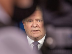 Ontario Premier Doug Ford speaks at a briefing at Queen’s Park in Toronto on Friday, January 8, 2021.