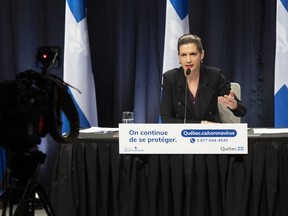 Quebec Deputy premier and Public Security Minister Genevieve Guilbault speaks at a news conference on the COVID-19 pandemic, Thursday, January 7, 2021 at the legislature in Quebec City. Guilbault outlined the rules as a curfew will be imposed on Saturday Jan. 9 from 8 p.m. to 5 a.m.