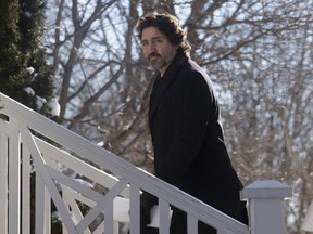 Prime Minister Justin Trudeau walks up the front steps of Rideau Cottage following a news conference in Ottawa,  Friday, January 8, 2021.