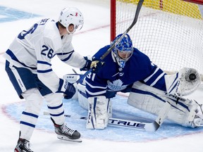 Frederik Andersen makes a glove save on winger Jimmy Vesey during last night’s Blue-White game at Scotiabank Arena. The Whites won with William Nylander scoring twice.