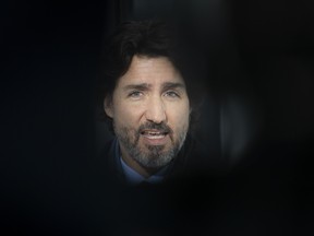 Canadian Prime Minister Justin Trudeau delivers his opening remarks at a news conference outside Rideau cottage in Ottawa, Tuesday, January 19, 2021. THE CANADIAN PRESS/Adrian Wyld