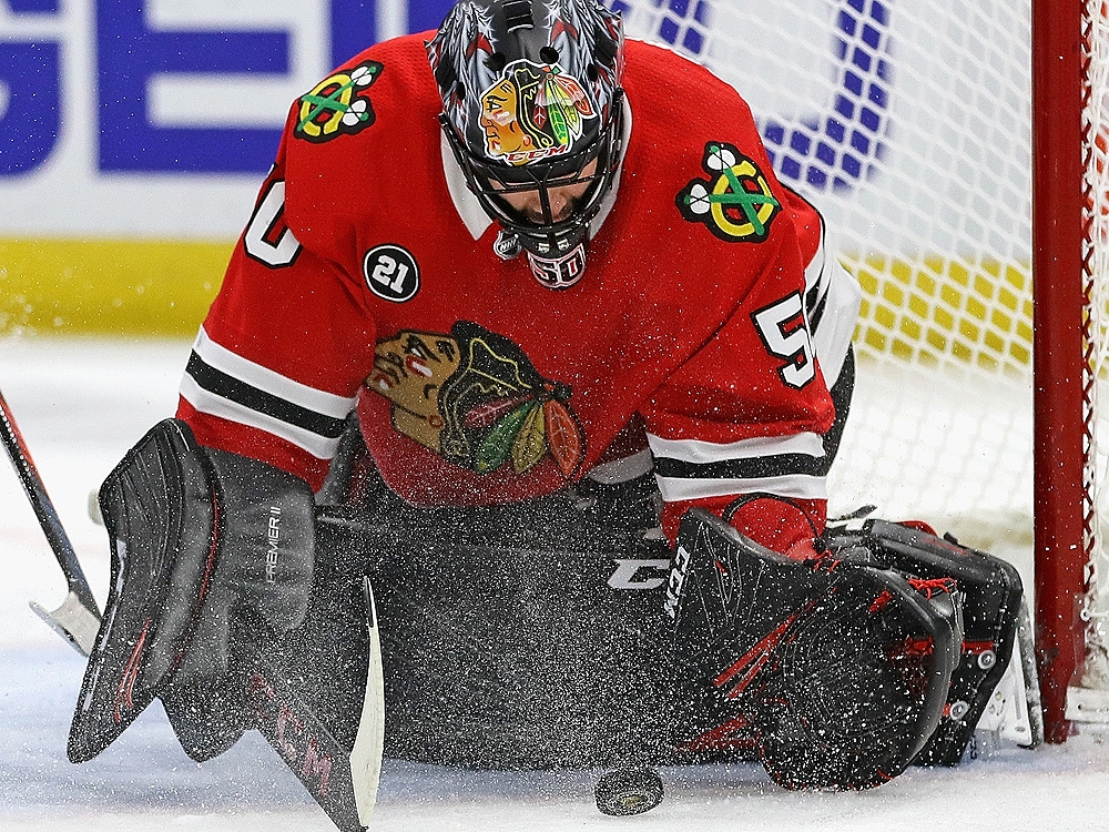 Chicago Blackhawks goalie Corey Crawford makes a save during the